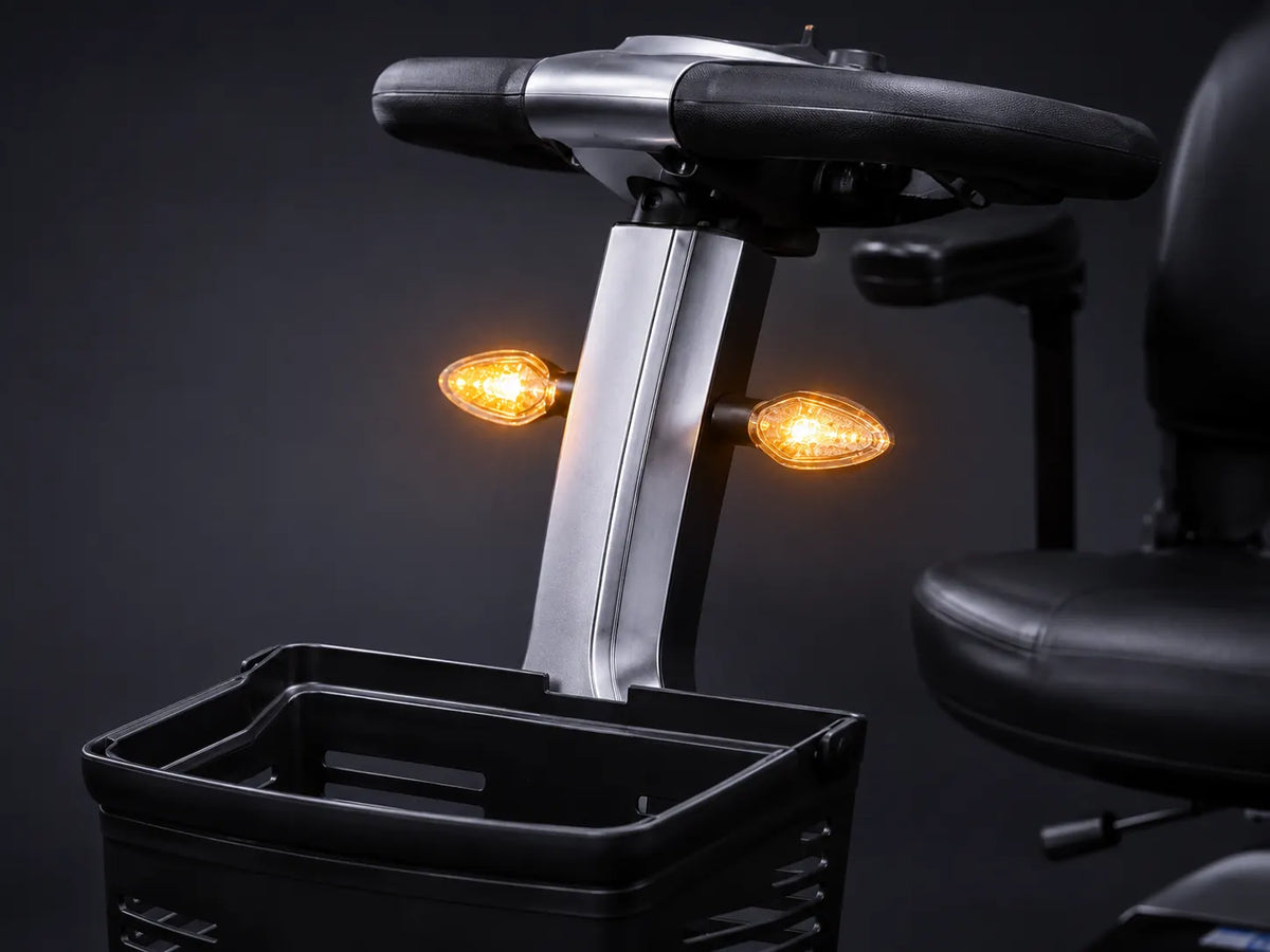 Mobility scooter with illuminated turn signals